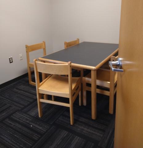 atudy room with table and chairs for 1-5 people