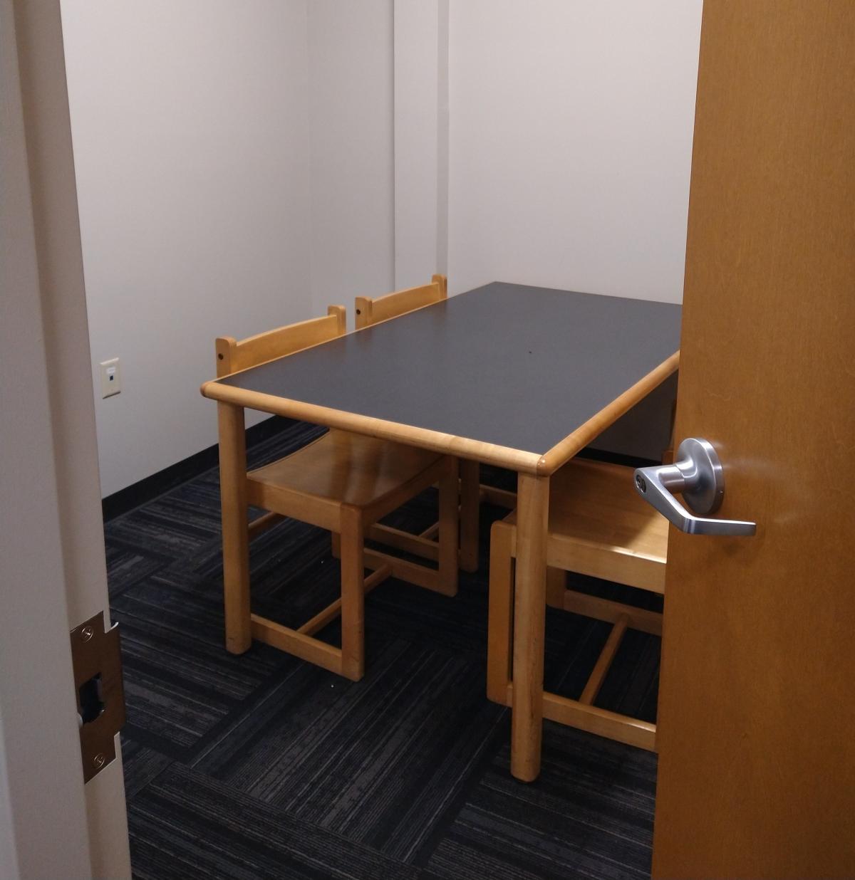 study room with table and chairs